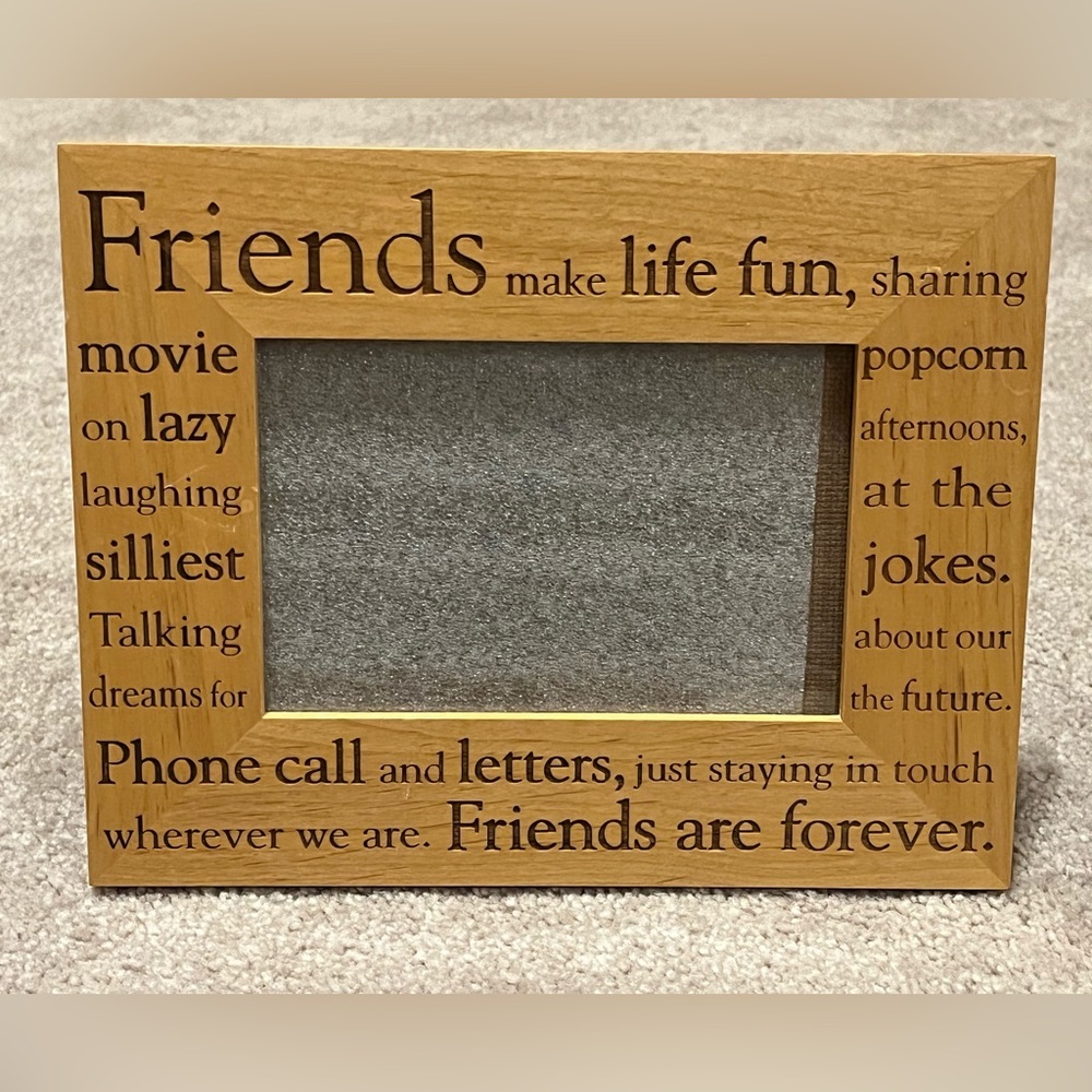 Friends wooden picture frame. Good used condition